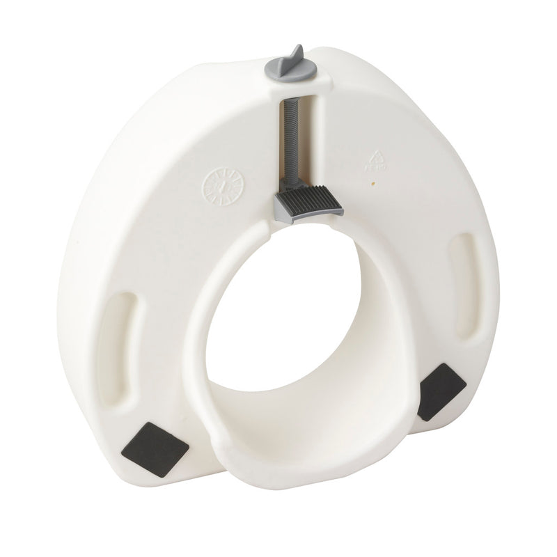 Underside of the raised toilet seat showing the locking mechanism and non-slip padding